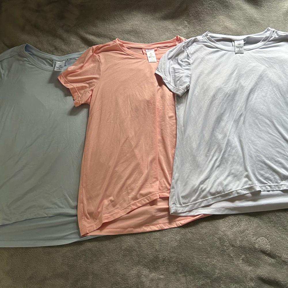 Three pairs of members mark womens T-shirts